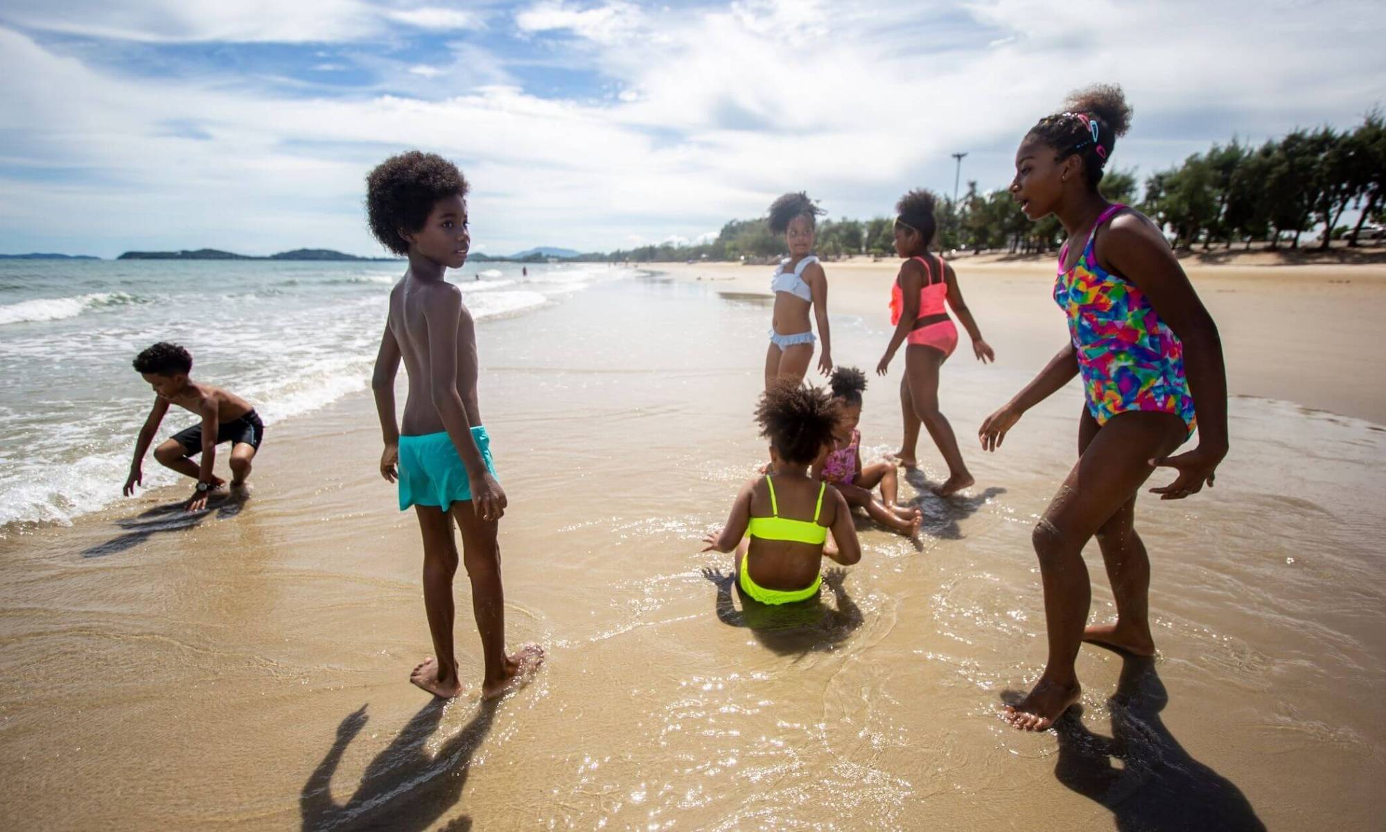 Black Kids Having Fun On The Beach